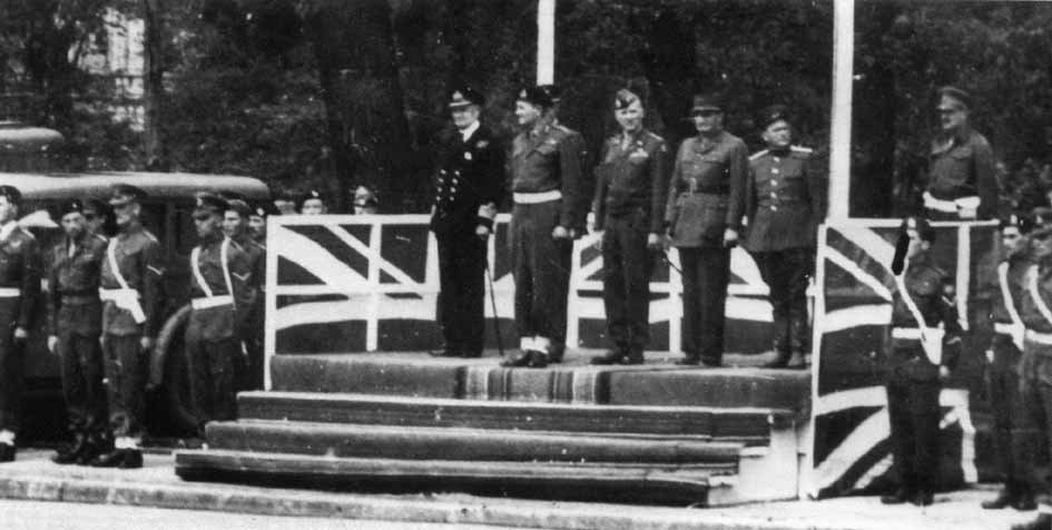 Major General Lynne, GOC 7th Armoured Division, preparing to take the salute, accompanied by US, French and Russia Officers.