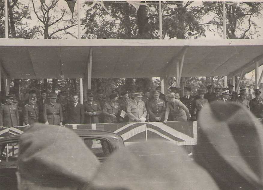 Closer view of the Reviewing Rostrum, showing Winston Churchill, General Montgomery and Field Marshal Alanbrooke