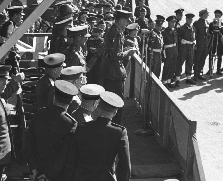 Sir Brian Robertson with Patton looking straight ahead. There was obviously some competition between Patton and Zhukov they were both edging to get closer to the front of the saluting stand after each had given their speeches. Photographer Reg Pidsley Copyright © Rob Clayton